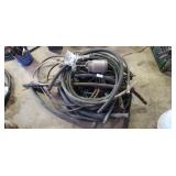 Assorted hoses, and paint gun