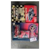 Two race cars in packages