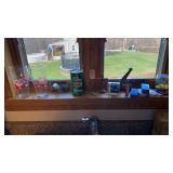 Windowsill contents, coca-cola glasses, 7 up