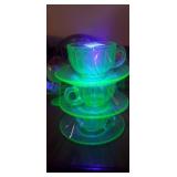 3 uranium glass saucers,  and teacups