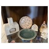 Shelf lot of ceramic religious items, plates and