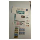 Lot of new unused stamps & postcards