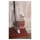 Oil lamp and open oil bottle