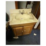 Bathroom sink and cabinet