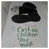 Cast iron children shoe molds