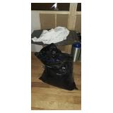 Large bag of white and black tablecloths