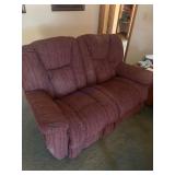 Two-seat red upholstered reclining loveseat