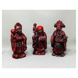 3 red resin chinese deities