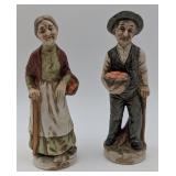 Pair of Elderly Farmer Porcelain Figurines