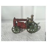 ARCADE CAST IRON TRACTOR W/DRIVER