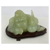 Carved Jade Buddha Sculpture on Wooden Base