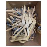 Lot of wood hangers with pant clips