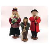 Set of Three Caroler Figurines on Wooden Bases