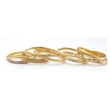 JEWELRY. (12) Assorted 14kt and 18kt Gold Bangles.