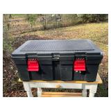 Black plastic storage trunk