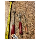 3- red wood handled kitchen utensils