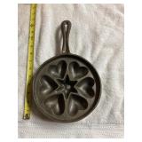 Cast iron star and hearts cornbread pan