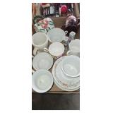 Lot of tea cups, and plates. Pepper and Salt