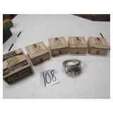 4- NOS CROWN WEANING RINGS, ICE SKATES SHARPNERS