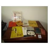 TRACTOR MANUALS, POCKET LEDGERS; TOTE OF MOWER