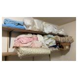 Shelf of Linens including Vintage