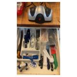 Electric Knife Sharpener and Drawer Contents