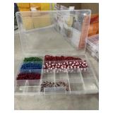 Plastic organizers with Christmas bead garland