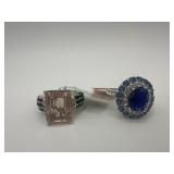 2-QVC RINGS SIZE 7 1-PINK STONE 1-BLUE STONE