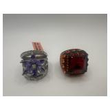 2-QVC RINGS SIZE SIX 1-PURPLE STONE 1-RED STONE