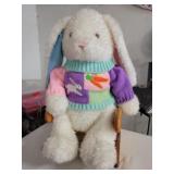 Fluffy Easter Bunny On A Wooden Rocking Chair