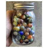 Plastic Jar of Assorted Collectible Marbles