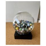 Round Glass Display of Assorted Marbles