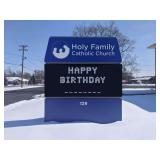 Happy Birthday Greeting on the Holy Family Marquee