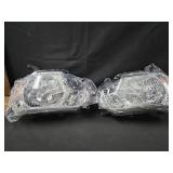 Pair of Headlights. Unknown vehicle