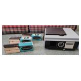 Promaster 500 slide projector and 3 boxes of