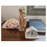 Nativity scene, child angel, Hym book and stack