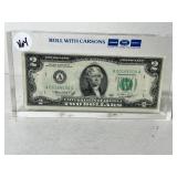 Two dollar bill paperweight