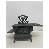 Crescent cast-iron stove