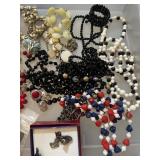 Costume jewelry necklaces and bracelets