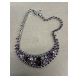 Costume jewelry necklace purple stones