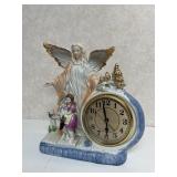 Angel and children porcelain clock