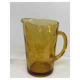 Amber colored water pitcher