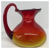 Amberina Blown Pitcher, Straw mark by handle