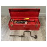 Old Red Metal Toolbox with Tools