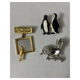 Costume jewelry, bird themed brooches