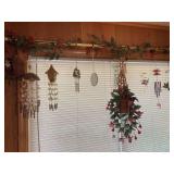 Nice group of six windchimes plus other decor items hanging on curtain rod