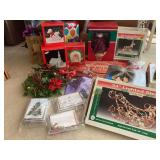 Large Christmas group of decorations. Fiber optic Santa, Christmas cards, Village Church, lighted sleigh and deer.