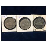 three 1969 Canadian Nickel Dollar Coins