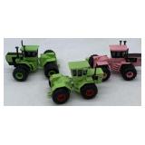 3 small Ertl tractors