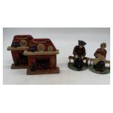 cast iron fireplace and Amish couple bookends